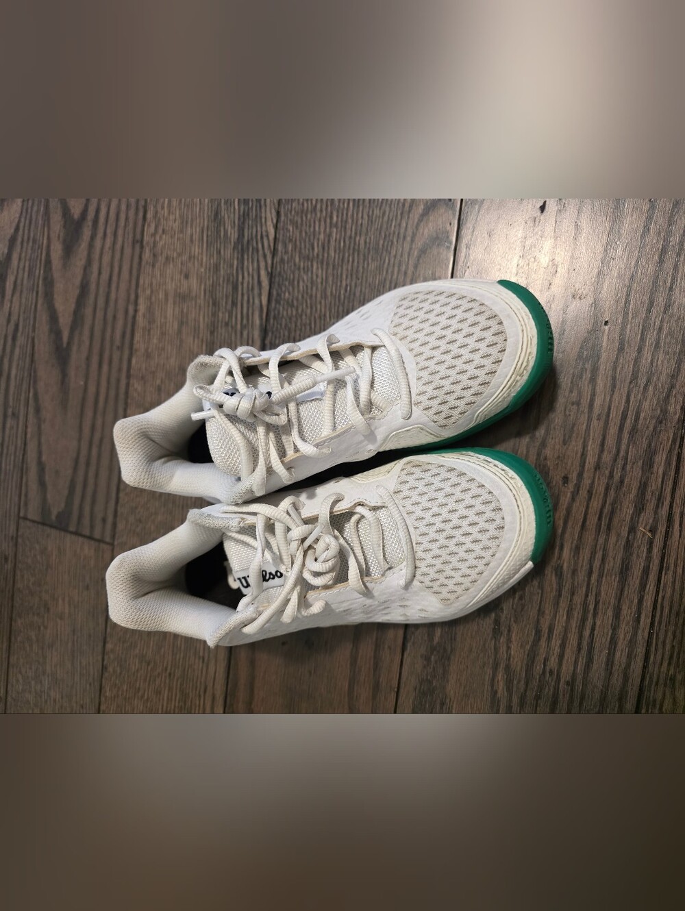Wilson White Athletic Shoes with Green Toe Accent